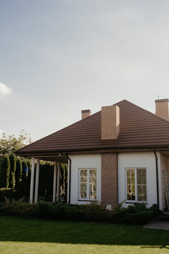 Charming modern bungalow with a spacious front yard, ideal for serene living.